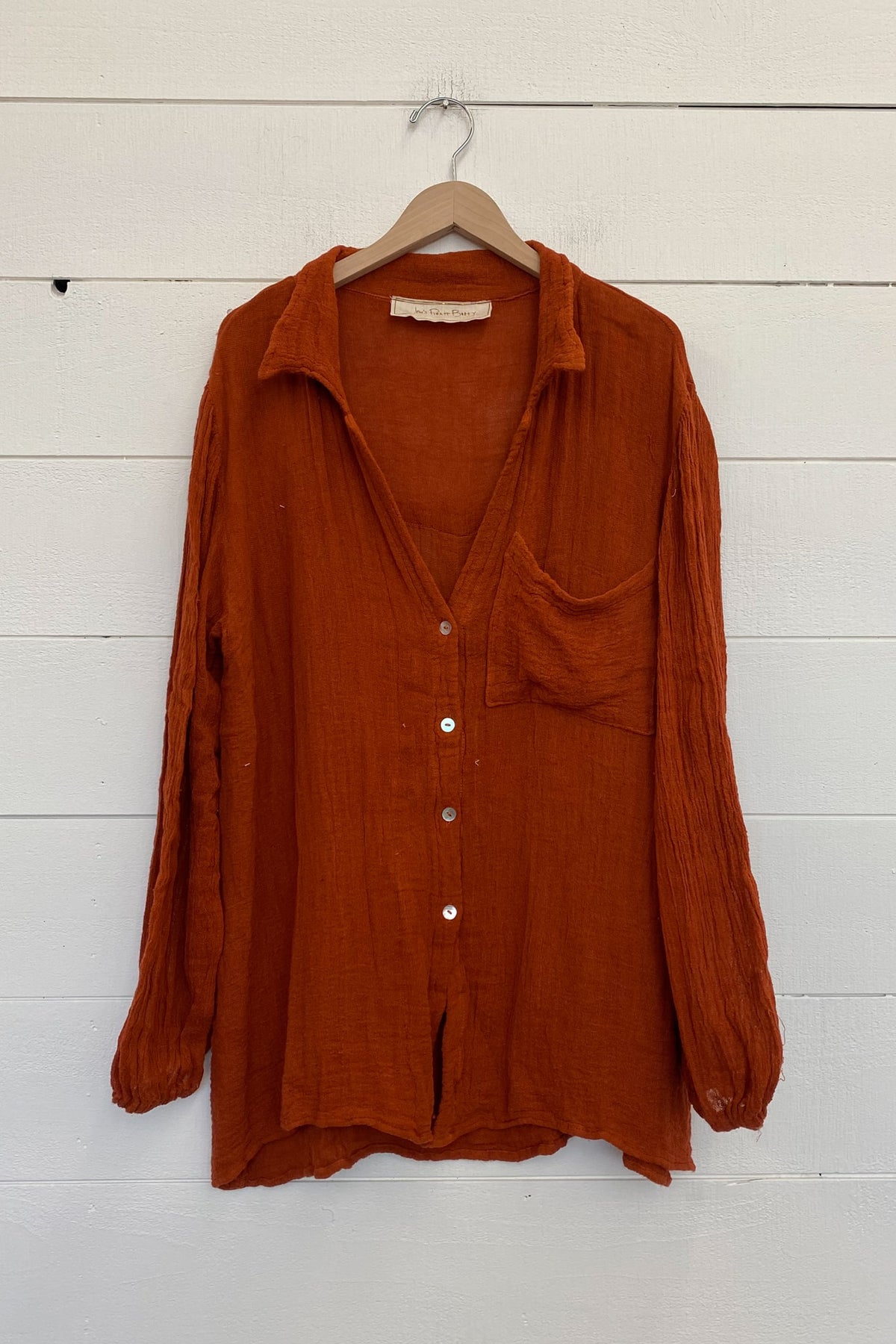 burnt orange gauze button up top