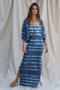 Blue and white tie dye maxi dress with side slits, a square neckline, and billowing sleeves